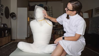 Elise Graves in 'Kept Under Wraps: Part Two'