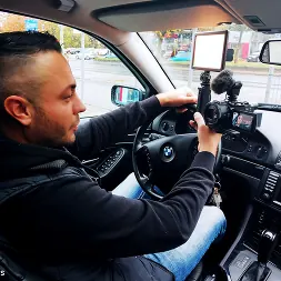 Sidney Dark in 'Kink Partners' German goth SIDNEY DARK rides his cock in the car! (Thumbnail 1)