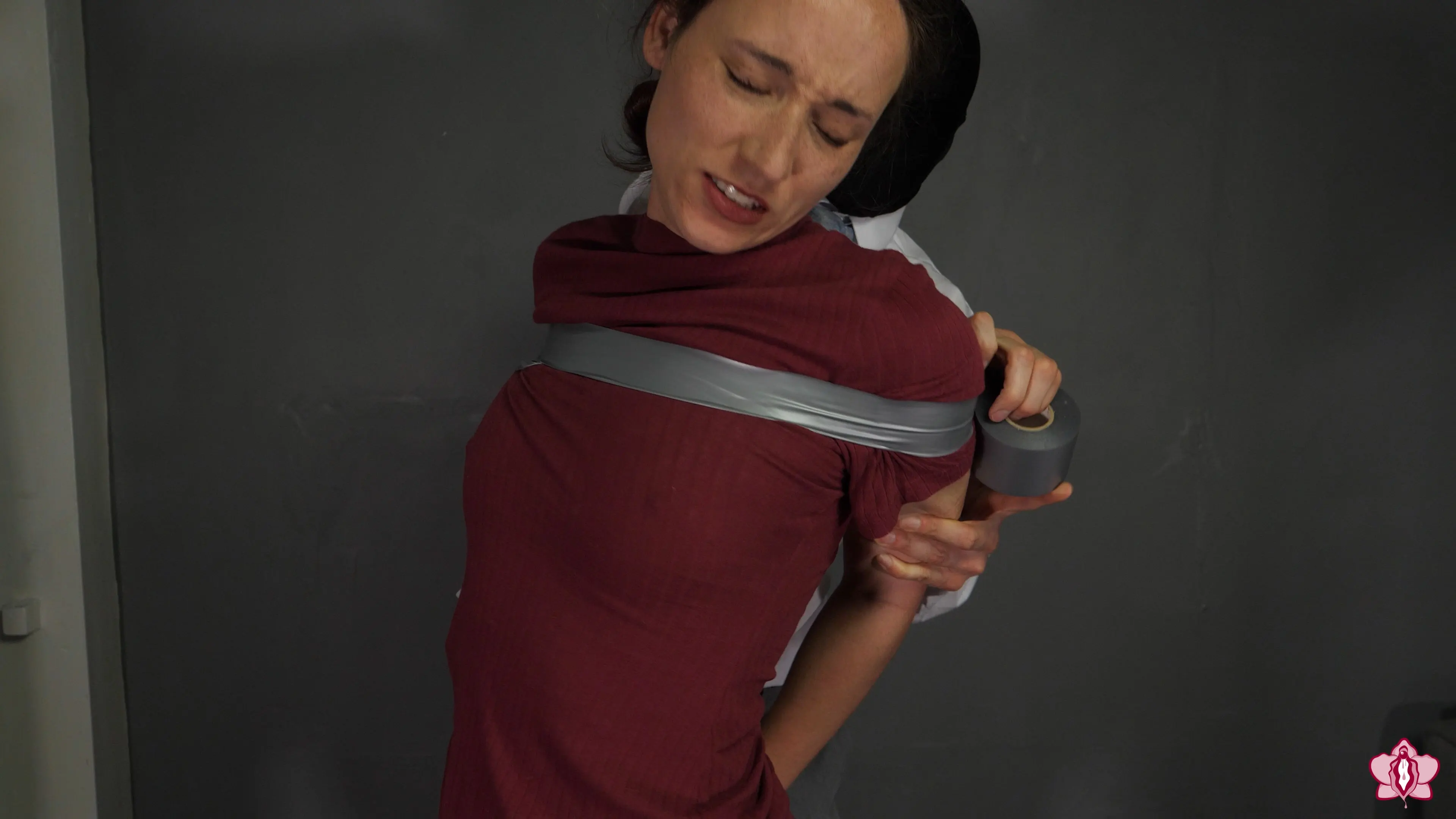 Kink Partners 'Helpless Tape Bondage Victim: Masked Captor Overpowers Innocent Slave Mila' starring Slave Mila (Photo 9)