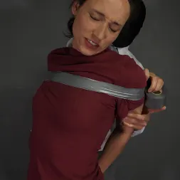 Slave Mila in 'Kink Partners' Helpless Tape Bondage Victim: Masked Captor Overpowers Innocent Slave Mila (Thumbnail 9)